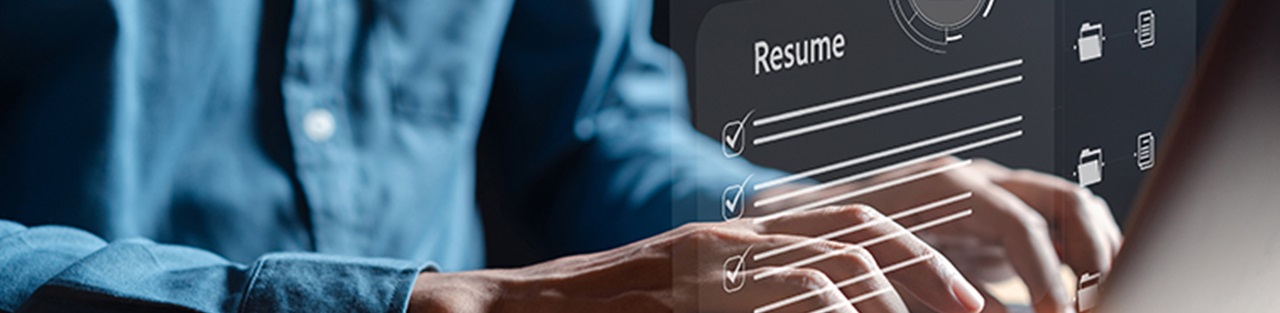 Man typing resume