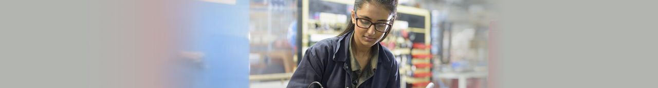 Student in shop utilizing technical skills